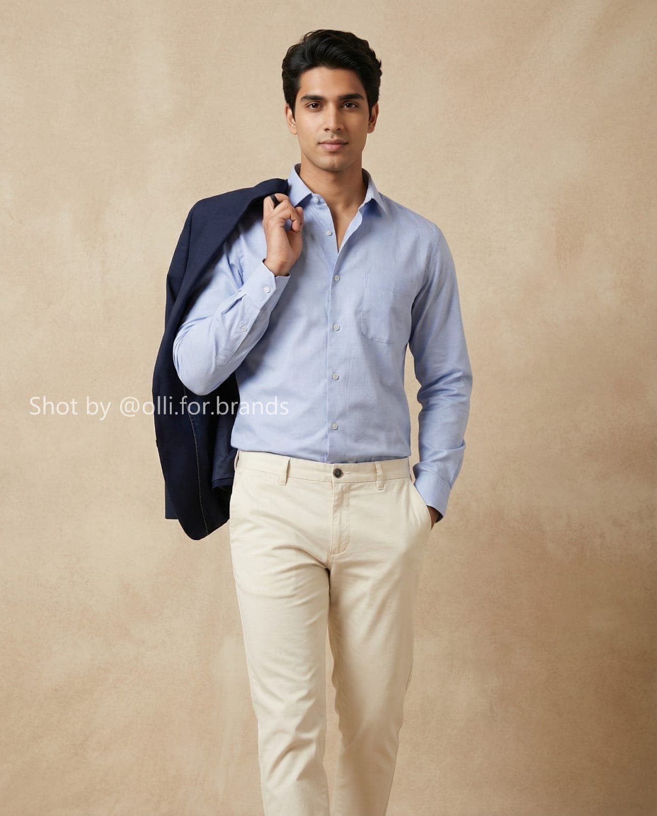 Navy Blazer and Cream Trouser men's wear lookbook image.
